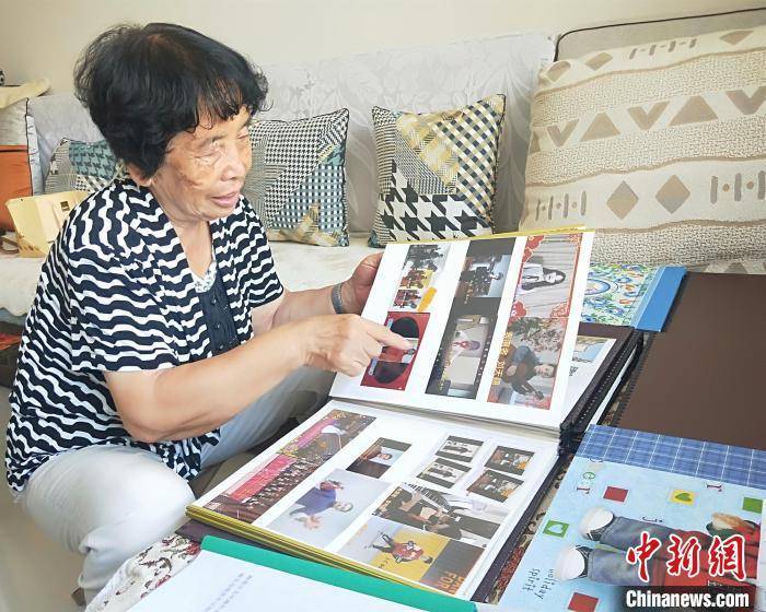 14年拍摄千余张照片 河北78岁老人为小区留下“光影档案”