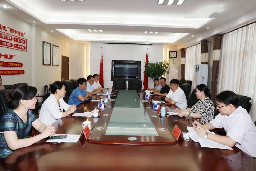 王新会会见信阳市政府副市长吕旅一行_发展_科技_创新