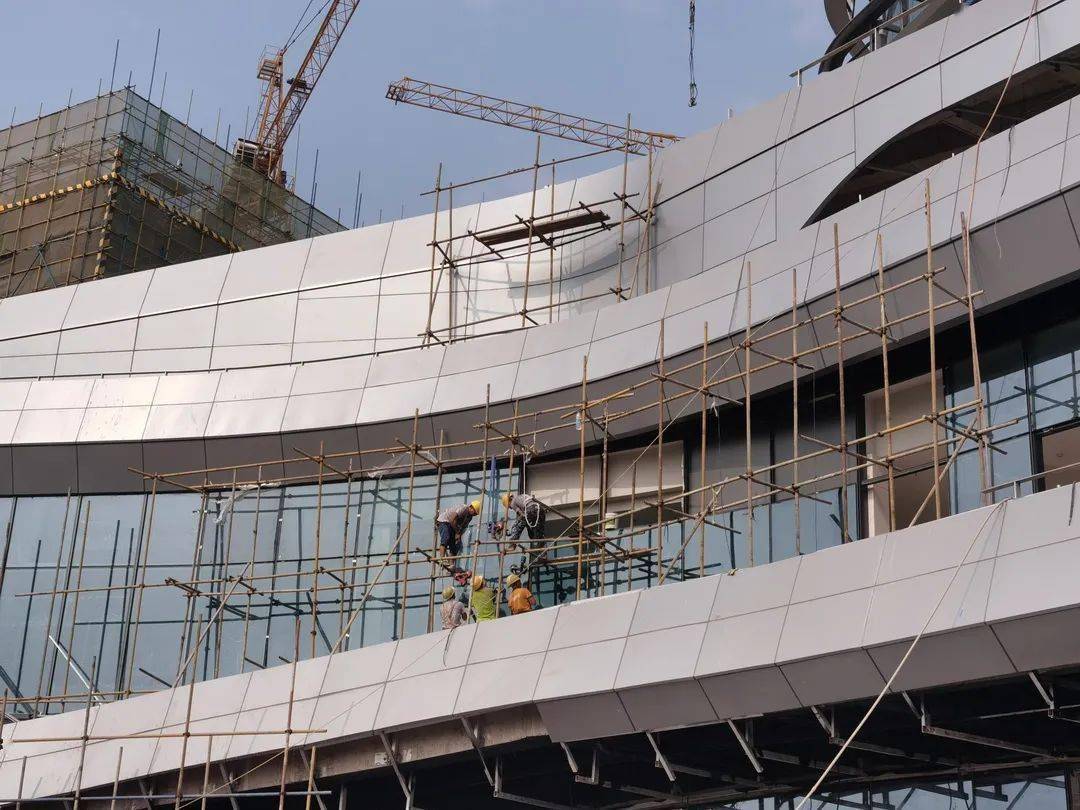 材料美学|铝单板鳞片幕墙使建筑极具雕塑感