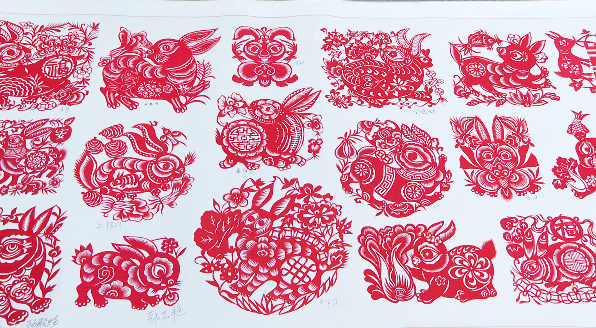 安塞:卯兔呈祥迎佳节 非遗剪纸闹元宵_兔子_石榴_剪刀