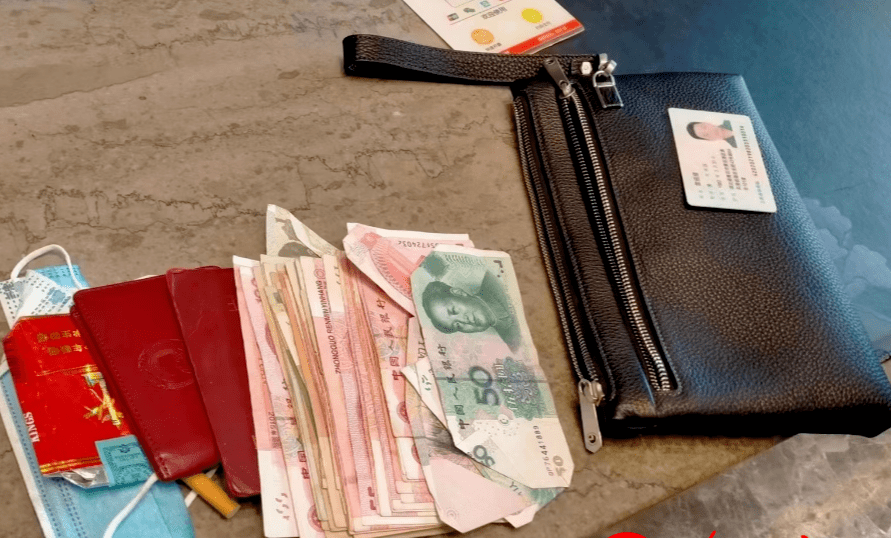 央视记者在商丘捡到一个钱包,然后……_雷先生_赵磊_好人