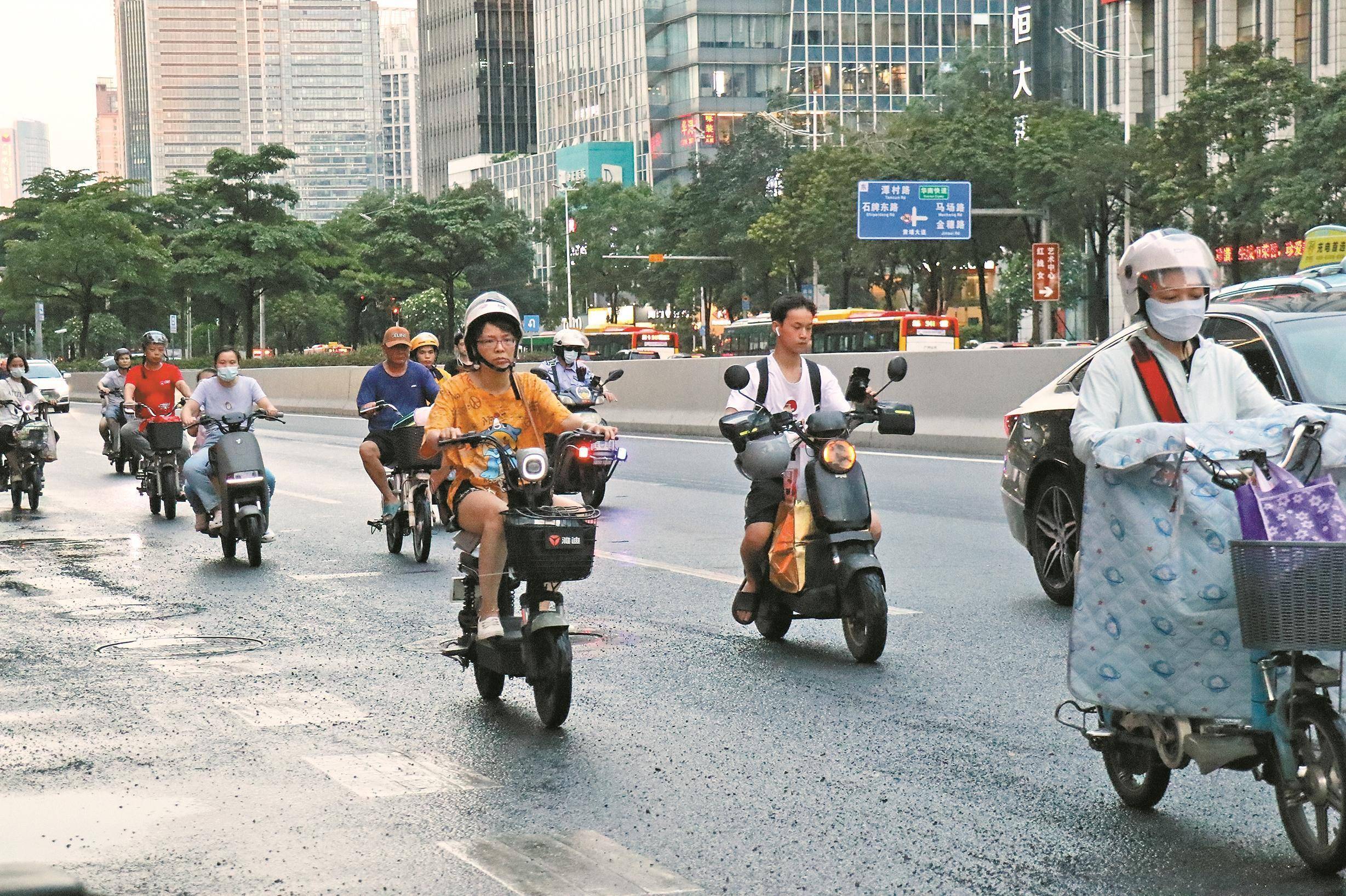 广州拟分路段分时段限行电动自行车 各方交通参与者有赞有弹