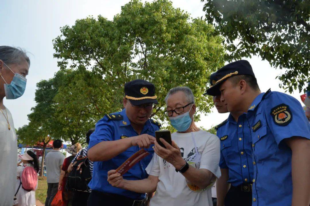 红谷滩区城管执法大队圆满完成中国南昌国际龙舟赛保障任务_九龙湖