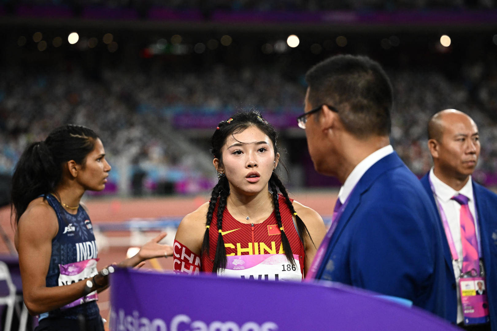 资深田径裁判长释疑_选手_成绩_中国