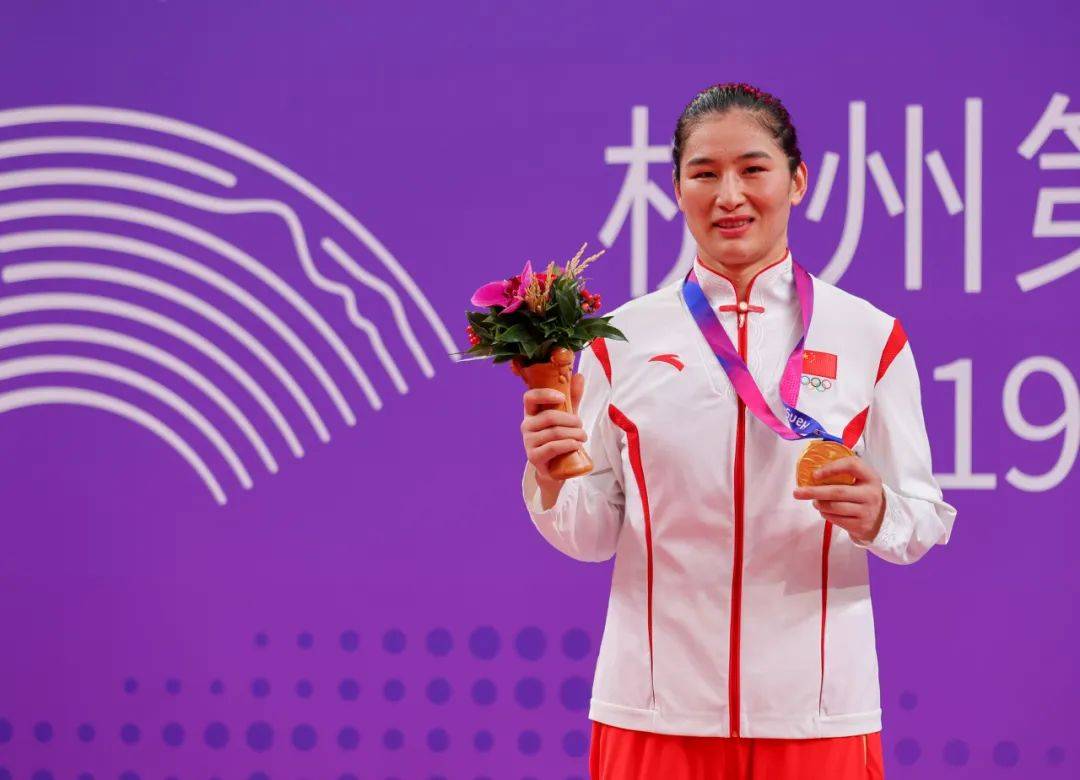 我区运动员李倩获得杭州亚运会女子拳击75公斤级比赛金牌_中国队